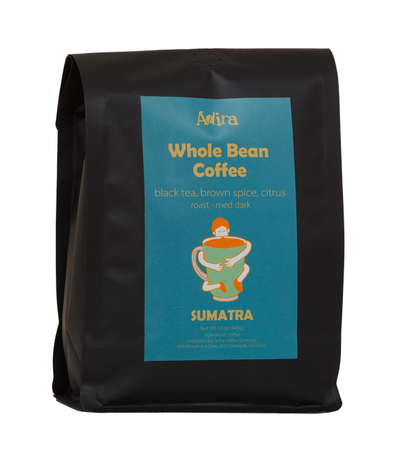 Black coffee bag with a blue label featuring Indonesia 'Adira Sumatra' branding and Sumatra coffee description.